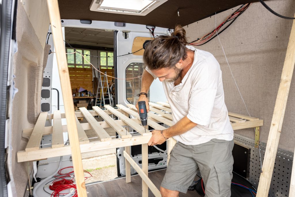 Man building a DIY van conversion | Best vans to live in full-time